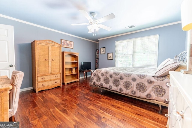 bedroom with ceiling fan, dark wood-type flooring, and ornamental molding