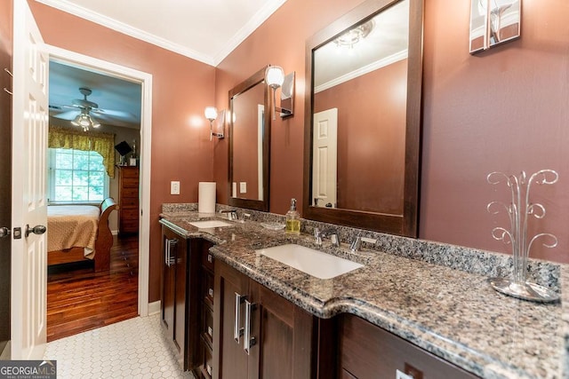 bathroom featuring ceiling fan, tile patterned floors, crown molding, and vanity