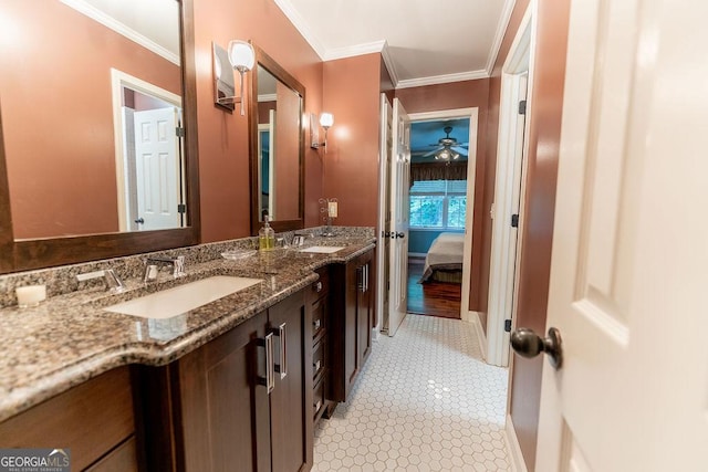 bathroom with vanity, tile patterned floors, ceiling fan, and ornamental molding