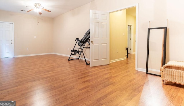 interior space featuring ceiling fan and light hardwood / wood-style flooring