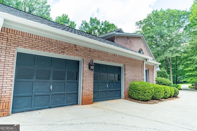 view of side of property featuring a garage