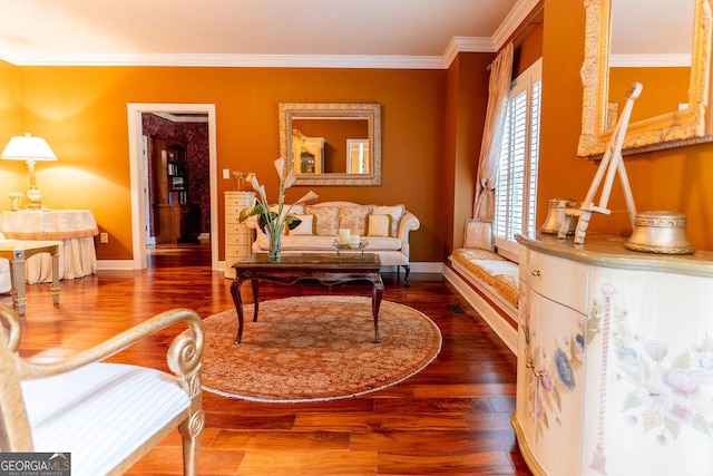 living room featuring ornamental molding and hardwood / wood-style floors