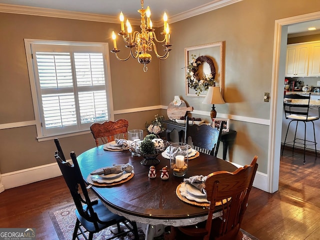 dining area with ornamental molding, dark hardwood / wood-style floors, and a chandelier