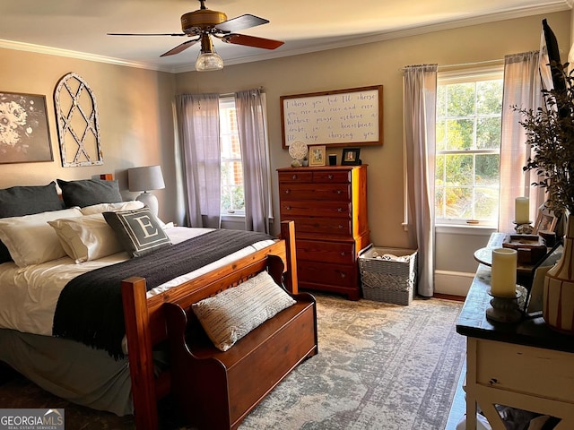 314 Cherokee Rd, Thomaston, GA 30286 - bedroom with ornamental molding, multiple windows, ceiling fan, and baseboards