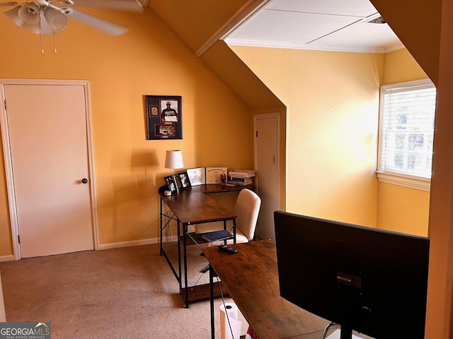 office featuring crown molding, lofted ceiling, light carpet, and ceiling fan