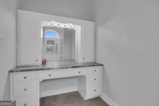 bathroom featuring hardwood / wood-style floors and toilet