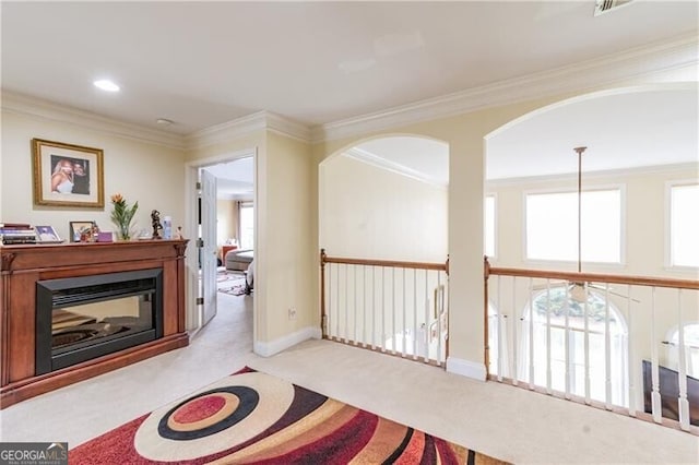 2080 Misty Oaks Dr, Buford, GA 30519 - corridor featuring carpet flooring, ornamental molding, healthy amount of natural light, arched walkways, and baseboards