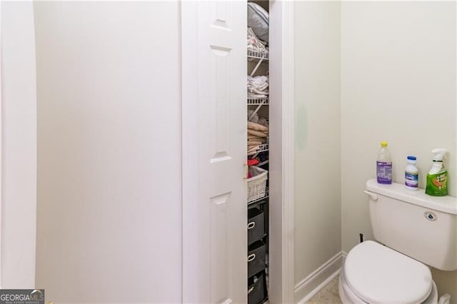 2080 Misty Oaks Dr, Buford, GA 30519 - bathroom with toilet and baseboards