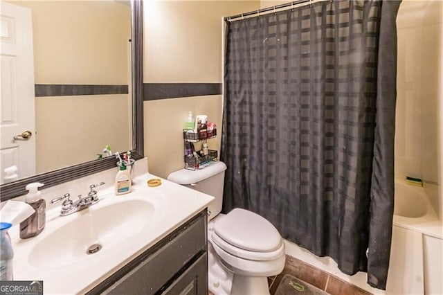 full bathroom with toilet, shower / tub combo with curtain, and vanity