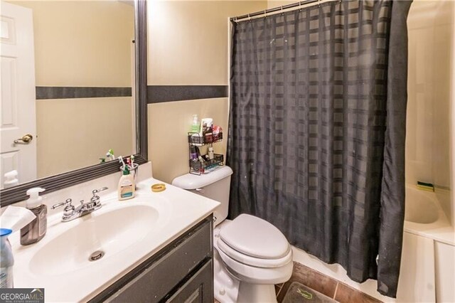 2080 Misty Oaks Dr, Buford, GA 30519 - full bath with toilet, curtained shower, and vanity