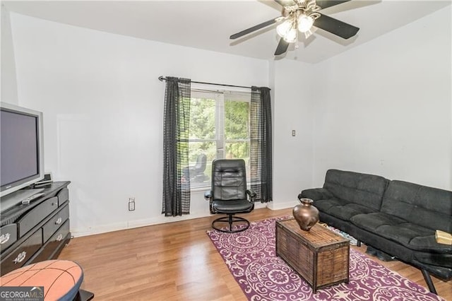 2080 Misty Oaks Dr, Buford, GA 30519 - living room with ceiling fan, wood finished floors, and baseboards