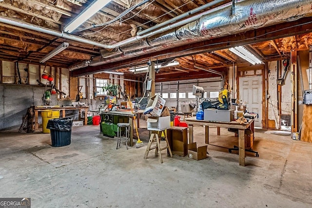 basement with a workshop area