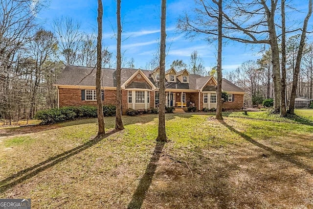 view of front of property with a front lawn