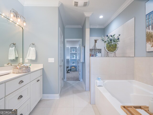 131 Ryan Nicholas Dr, Kingsland, GA 31548 - full bath with visible vents, ornamental molding, vanity, a garden tub, and tile patterned flooring