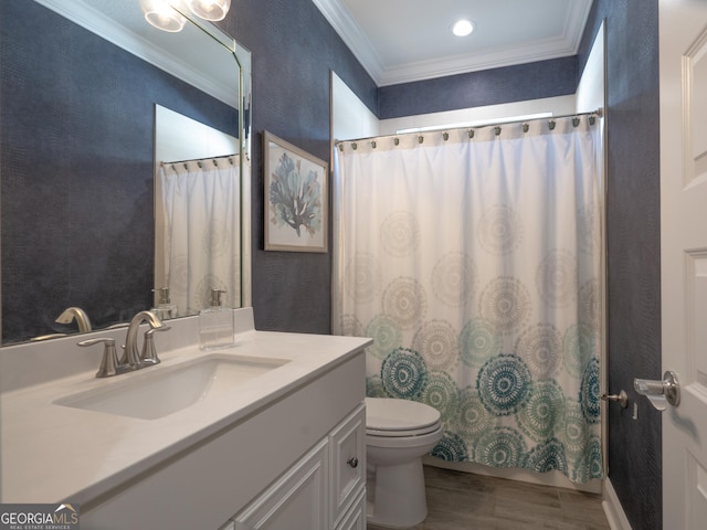 131 Ryan Nicholas Dr, Kingsland, GA 31548 - bathroom featuring a shower with curtain, vanity, toilet, ornamental molding, and wood finished floors