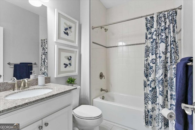 full bathroom with toilet, vanity, tile patterned floors, and shower / tub combo with curtain