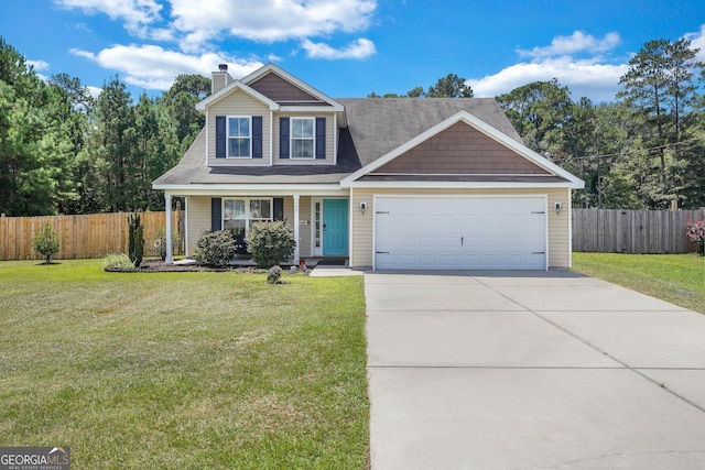 view of front of house with a front yard and a garage