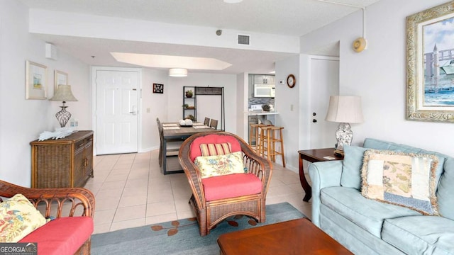 living room featuring light tile patterned floors