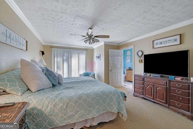 carpeted bedroom with ceiling fan, crown molding, and a textured ceiling