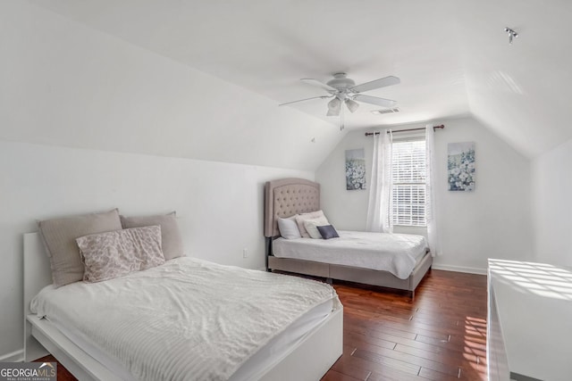 bedroom with lofted ceiling, ceiling fan, and dark hardwood / wood-style flooring