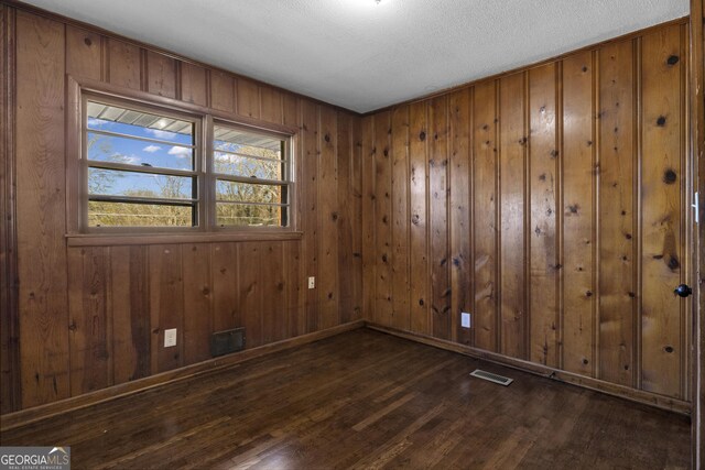 wooden deck featuring a storage shed