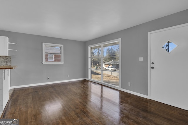 interior space featuring dark wood-type flooring