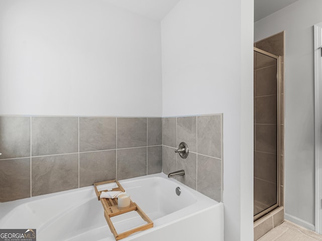 bathroom with independent shower and bath