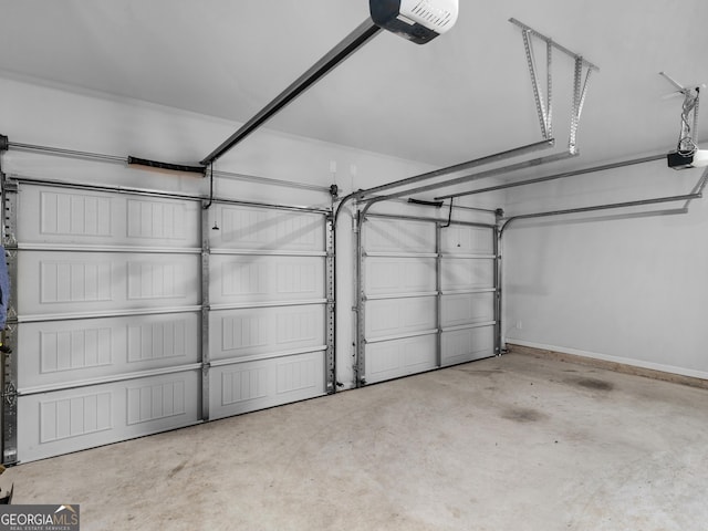 garage featuring a garage door opener