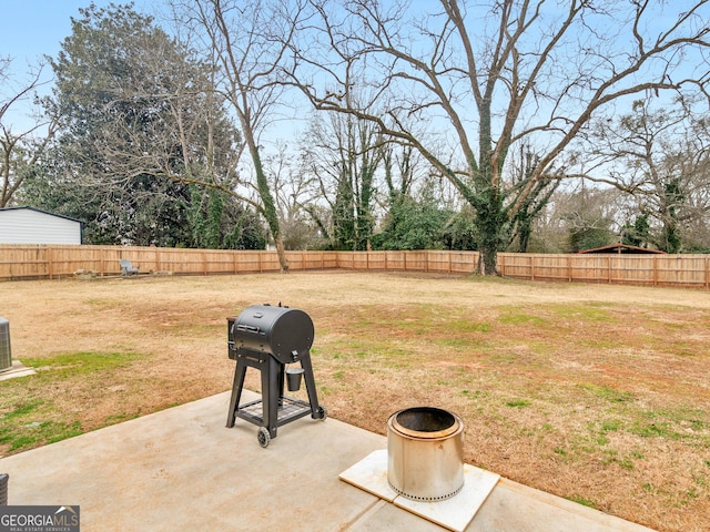 view of yard with a patio area