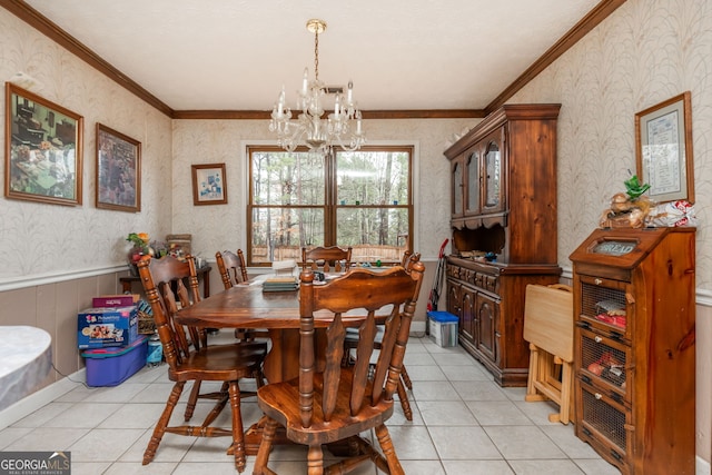 tiled dining space featuring a chandelier and crown molding