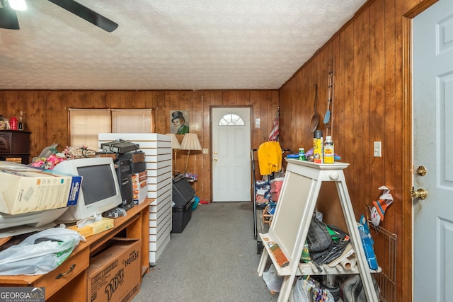 storage area featuring ceiling fan