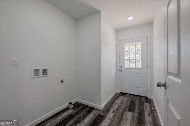 doorway featuring dark wood-style floors and baseboards