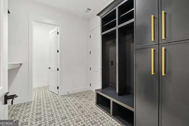 mudroom featuring visible vents and baseboards