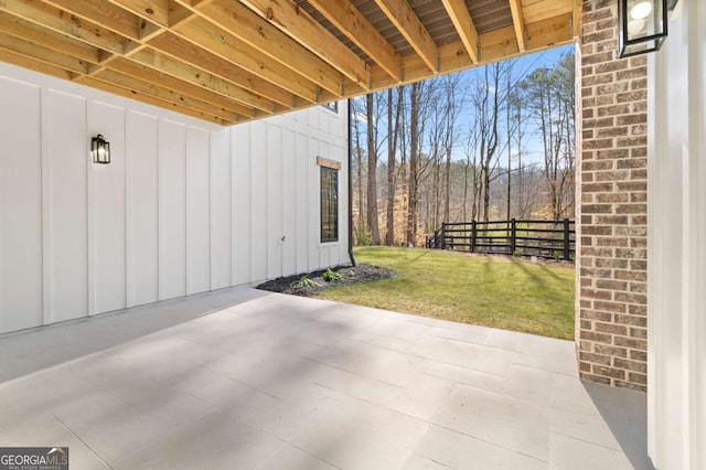 view of patio / terrace featuring fence