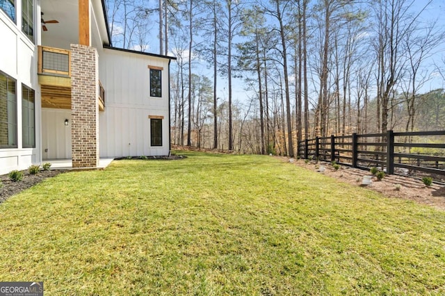 view of yard featuring fence