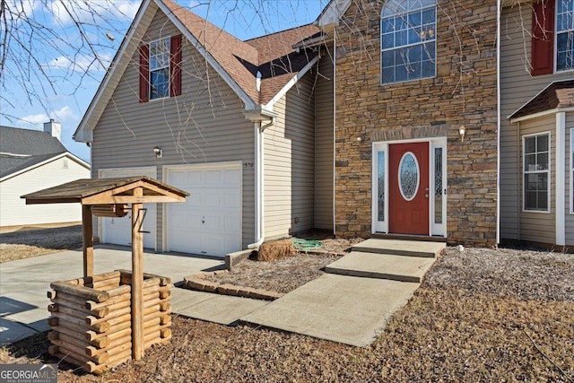 view of front of property featuring a garage