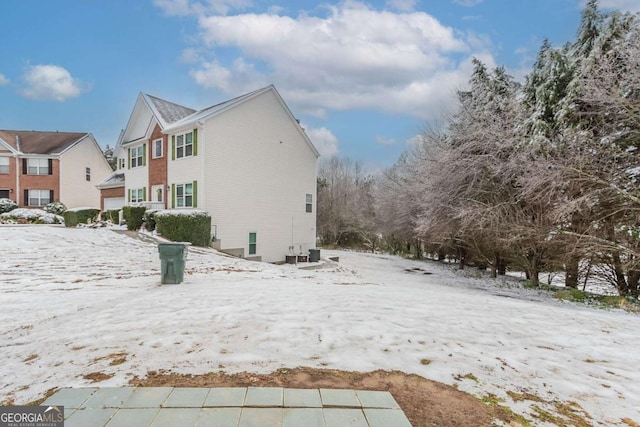 view of snow covered property