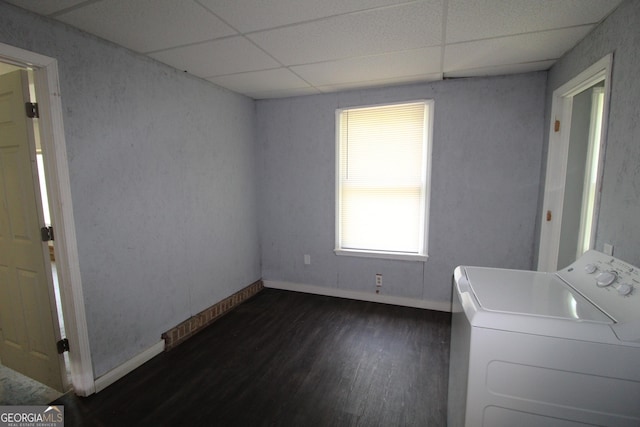 laundry area featuring dark hardwood / wood-style flooring and washer / clothes dryer