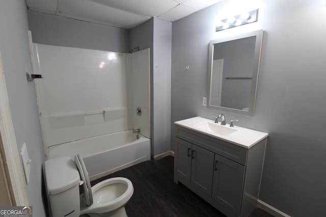 full bathroom featuring toilet, vanity, shower / bathing tub combination, and hardwood / wood-style floors