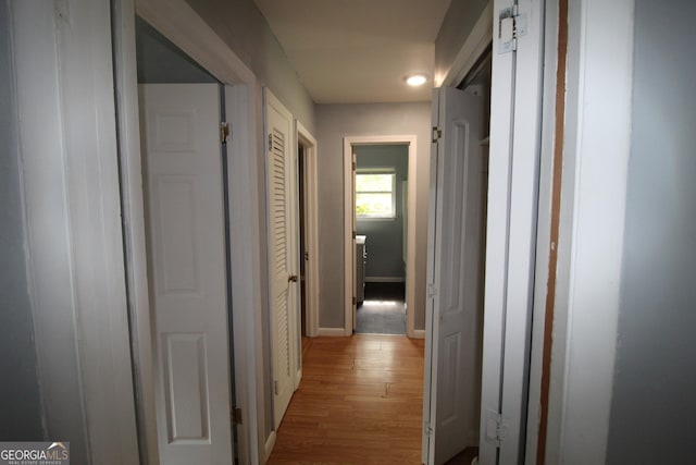 hallway featuring light hardwood / wood-style flooring