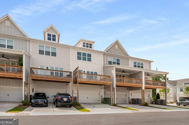 1708 Evenstad Way, Smyrna, GA 30080 - view of front of house featuring a ceiling fan, a garage, board and batten siding, and driveway