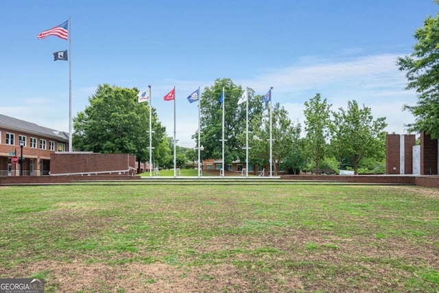 view of community with a lawn