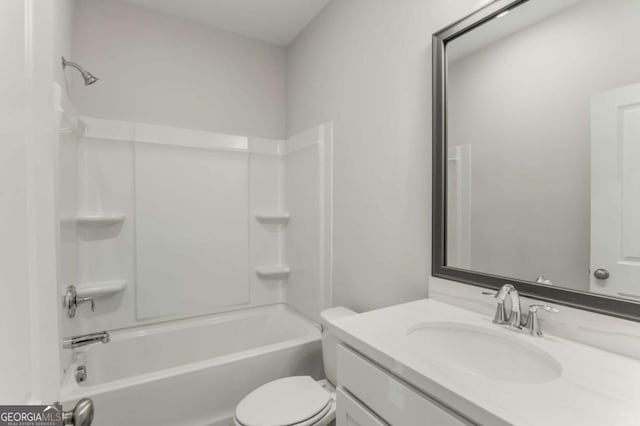 full bathroom featuring shower / washtub combination, vanity, and toilet