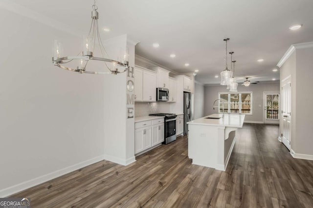 1708 Evenstad Way, Smyrna, GA 30080 - kitchen with stainless steel appliances, a chandelier, crown molding, an island with sink, and recessed lighting