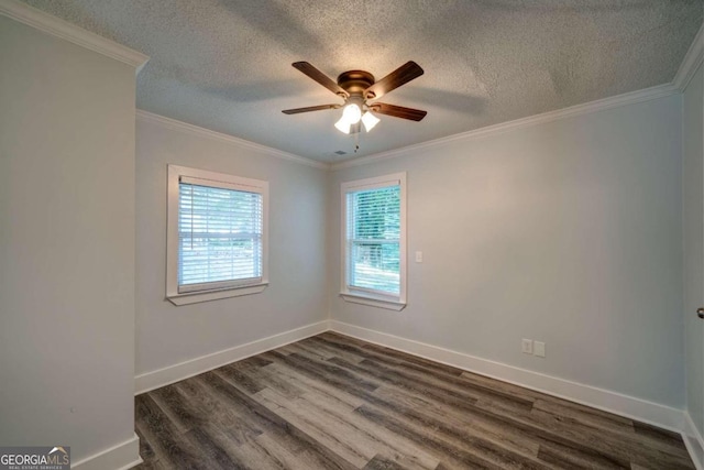 spare room with a textured ceiling, ornamental molding, ceiling fan, and dark hardwood / wood-style floors