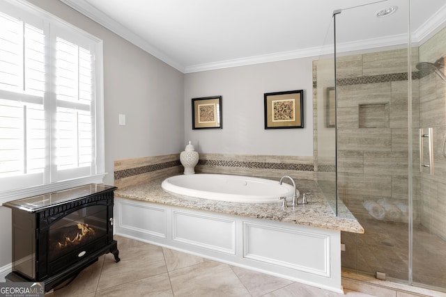 bathroom featuring tile patterned flooring, separate shower and tub, and crown molding