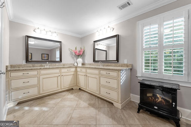 bathroom with vanity, tile patterned floors, and crown molding