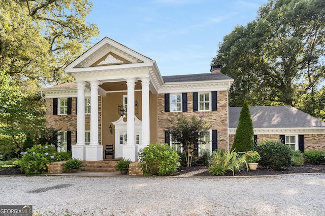 view of greek revival inspired property