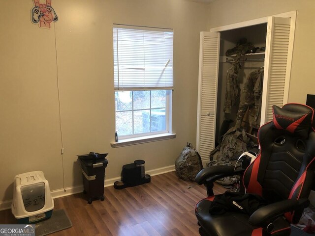 sitting room with hardwood / wood-style floors