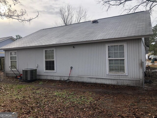 view of home's exterior featuring central air condition unit